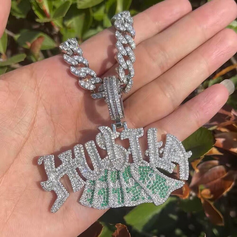 iced out “Hustla” money bag pendant with a matching 9mm Cuban link chain 20inch